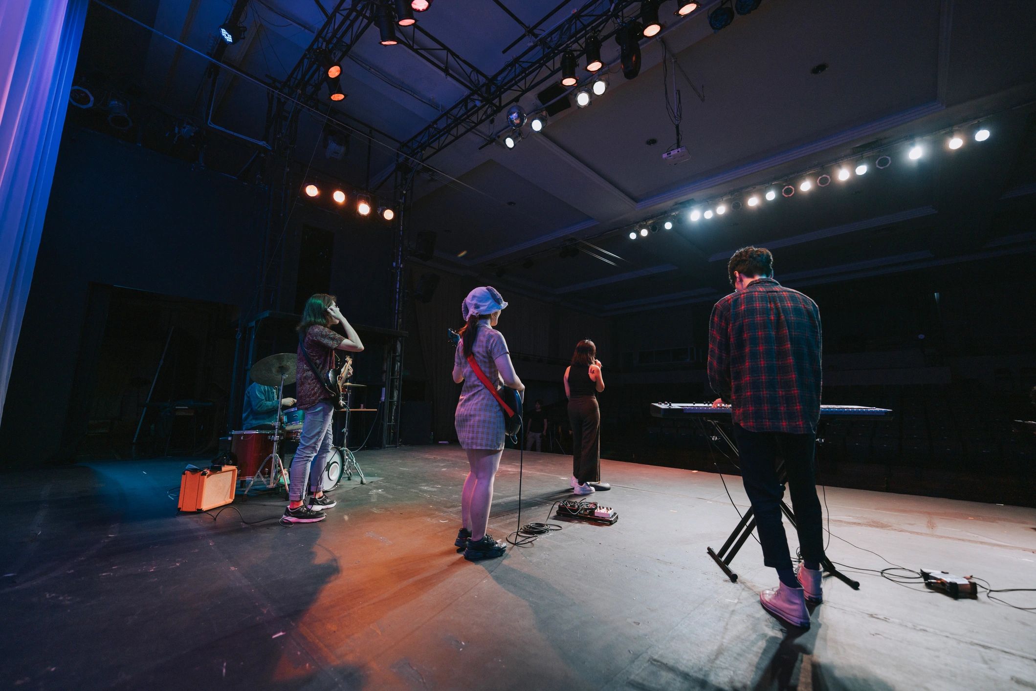 Freedom Movement performing live on stage under concert lights